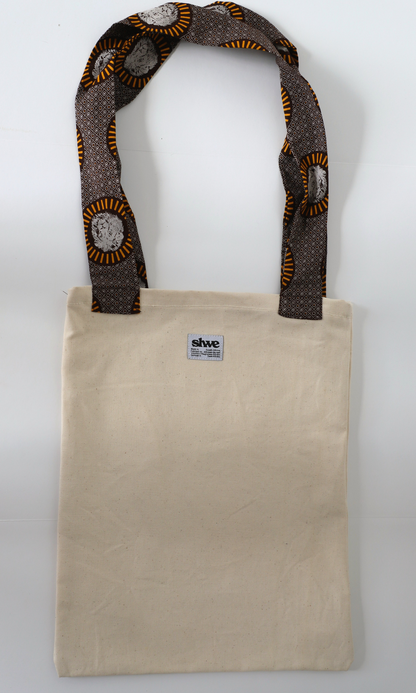 Tote bag avec bretelles en imprimé shweshwe  marron avec tête de lion 